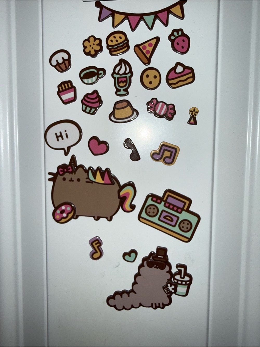 Pusheen the cat fridge magnet set with various food and music-themed stickers